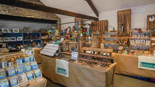 Stalls displaying small gifts filling a room